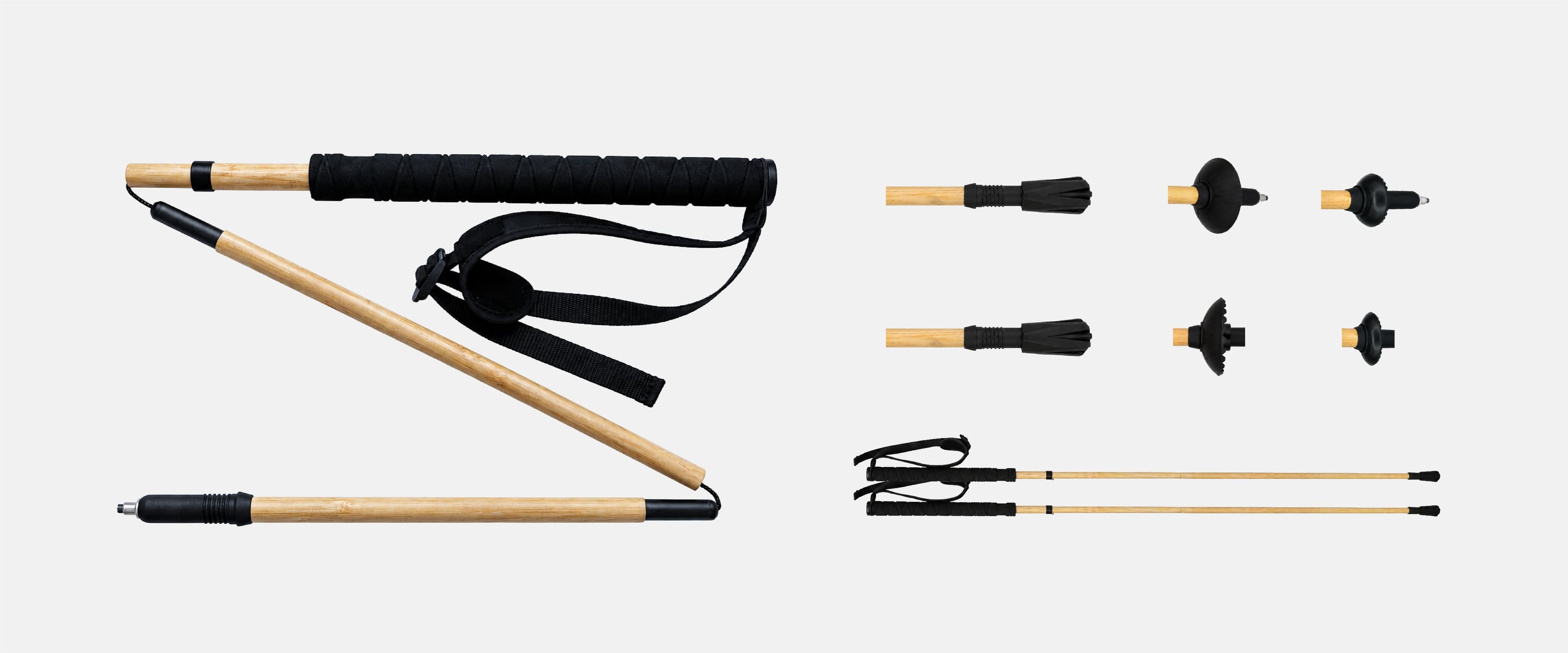 Folded NATORA bamboo-wrapped carbon trekking pole with three tip accessories